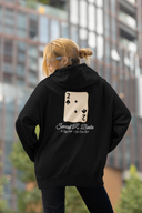 JB Custom Order Unisex Heavy Blend Hoodie featuring playing card graphic worn by person in urban setting.