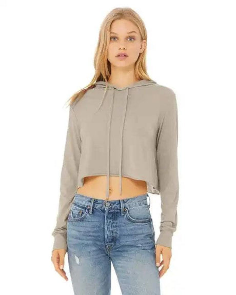 Cropped long sleeve hooded t-shirt in beige with raw bottom hem and cuffed sleeves.