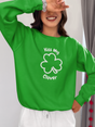 Green "Kiss My Clover" unisex heavy blend sweatshirt, comfortable fit.