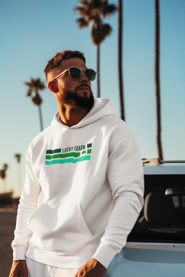 Lucky Charm Unisex Heavy Blend Hoodie with palm trees in the background.