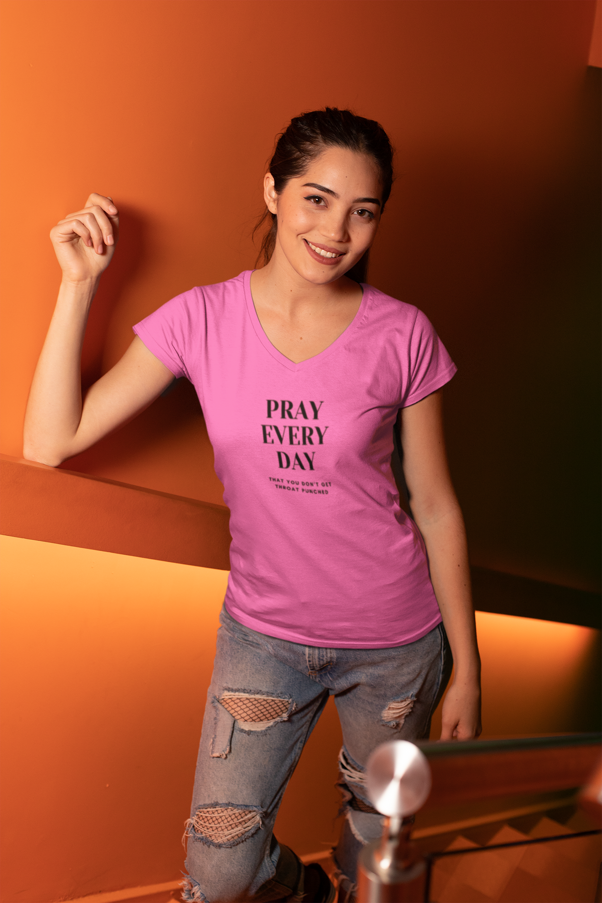 Pink women’s V-neck t-shirt with "Pray Every Day" text, featuring a stylish fit and lightweight fabric.